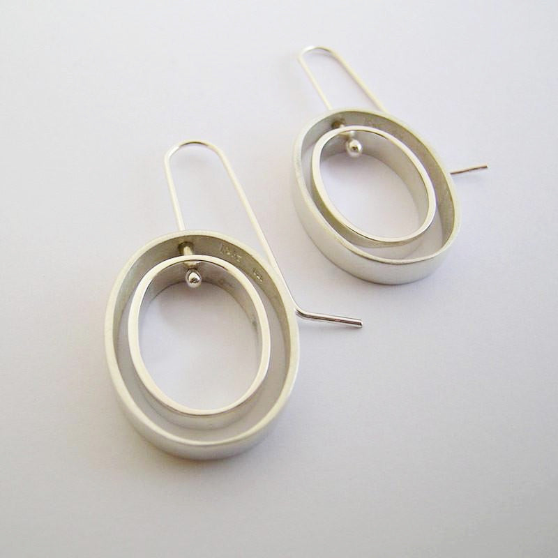Oval Moving Sterling Silver Earrings