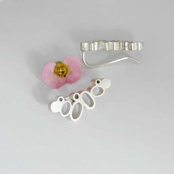 Spring along silver climber earrings