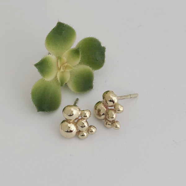 Lots of bubbles Yellow gold studs