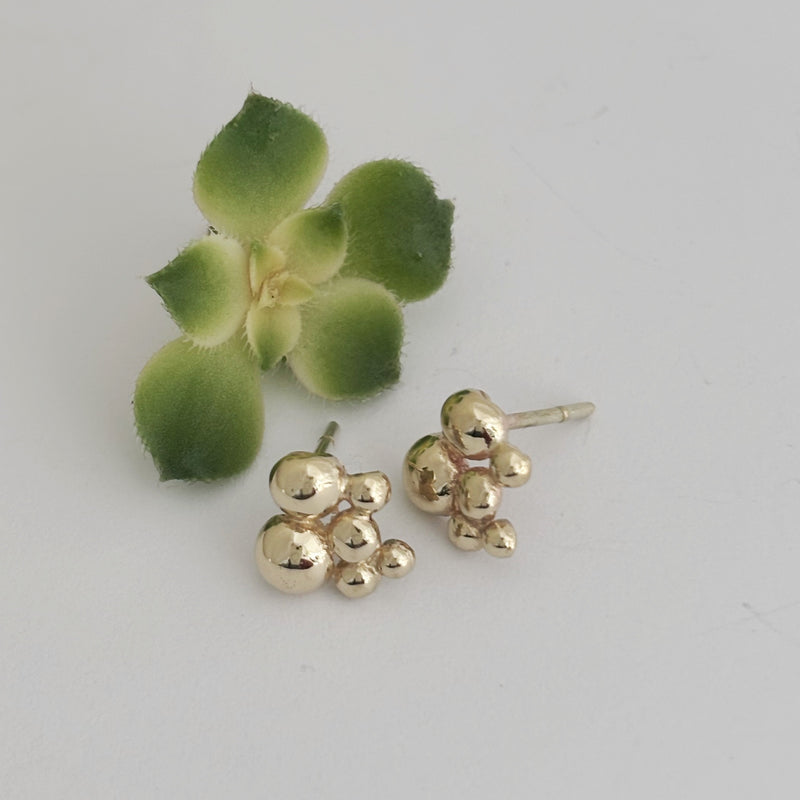 Lots of bubbles Yellow gold studs