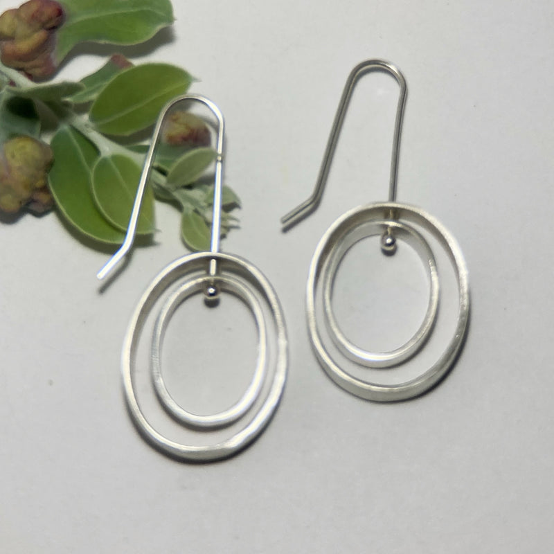 Oval Moving Sterling Silver Earrings