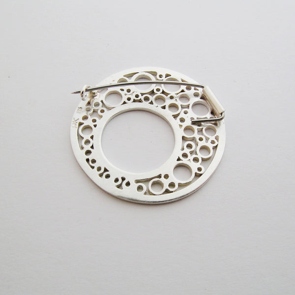 Silver brooch with stainless steel pin